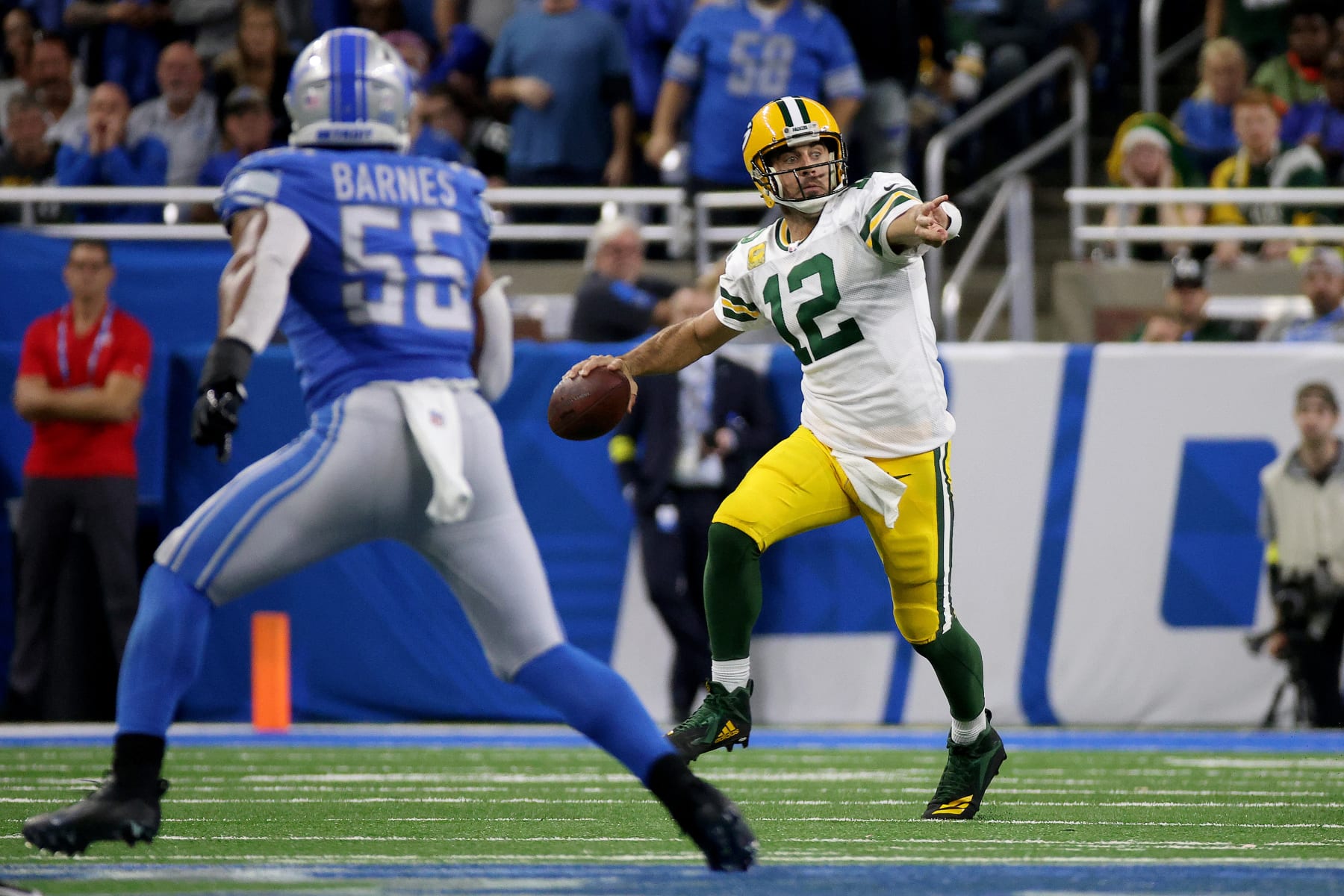 DETROIT, MICHIGAN - NOVEMBER 06: Aaron Rodgers #12 of the Green Bay Packers looks to pass in the fourth quarter of a game against the Detroit Lions at Ford Field on November 06, 2022 in Detroit, Michigan. (Photo by Mike Mulholland/Getty Images)