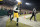 GREEN BAY, WISCONSIN - JANUARY 08: Quay Walker #7 of the Green Bay Packers leaves the field after being disqualified for an unsportsmanlike penalty during the fourth quarter against the Detroit Lions at Lambeau Field on January 08, 2023 in Green Bay, Wisconsin. (Photo by Patrick McDermott/Getty Images)