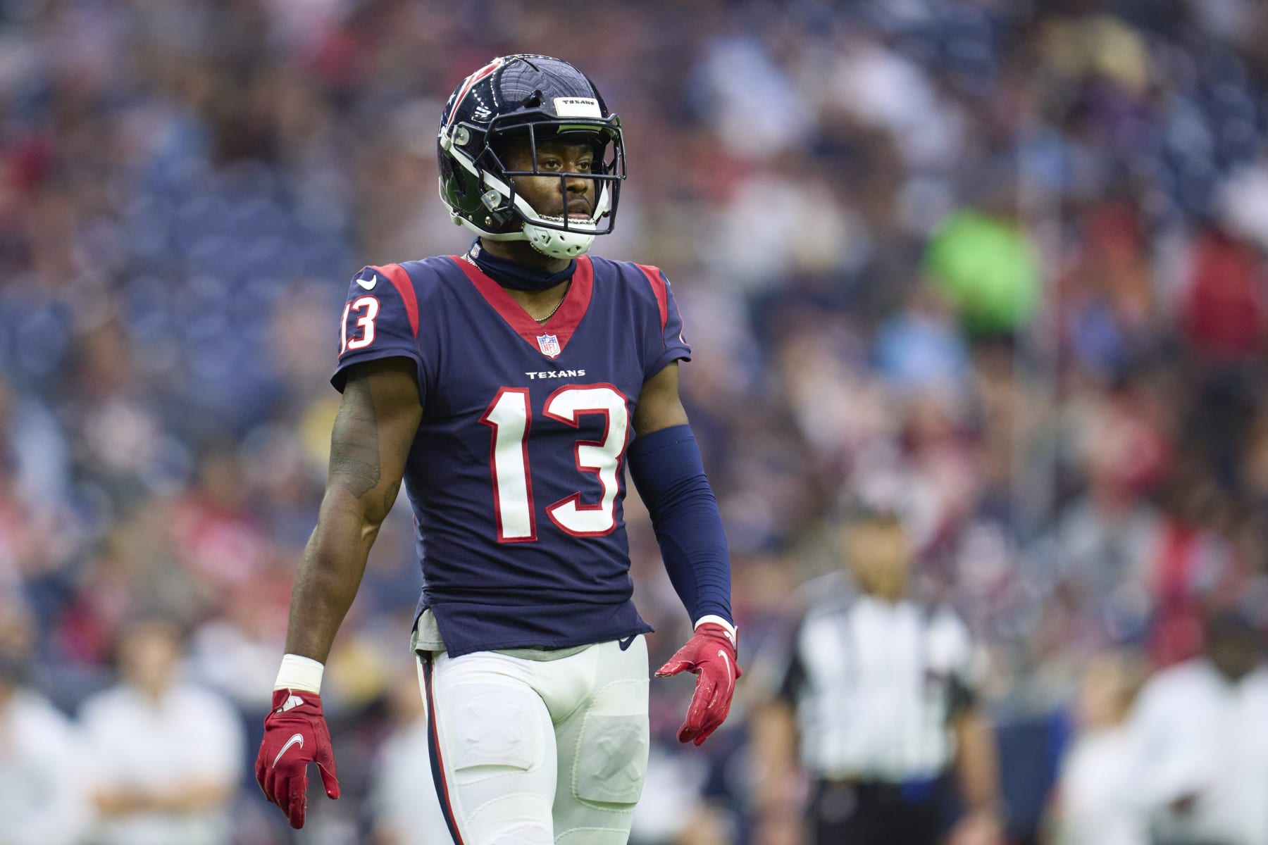 HOUSTON, TX - JANUARY 01: Brandin Cooks #13 of the Houston Texans walks towards the huddle against the Jacksonville Jaguars during the second half at NRG Stadium on January 1, 2023 in Houston, Texas. (Photo by Cooper Neill/Getty Images)