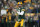 GREEN BAY, WISCONSIN - JANUARY 08: Aaron Rodgers #12 of the Green Bay Packers warms up prior to the game against the Detroit Lions at Lambeau Field on January 08, 2023 in Green Bay, Wisconsin. (Photo by Patrick McDermott/Getty Images)
