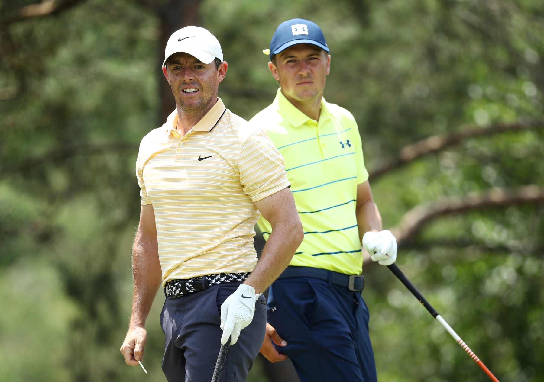 DUBLIN, OHIO - JULY 19: Rory McIlroy of Northern Ireland and Jordan Spieth of the United States look on from the second tee during the final round of The Memorial Tournament on July 19, 2020 at Muirfield Village Golf Club in Dublin, Ohio. (Photo by Jamie Squire/Getty Images)