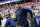 GLENDALE, AZ - DECEMBER 31:  Michigan Wolverines head coach Jim Harbaugh runs onto the field before the VRBO Fiesta Bowl college football national championship semifinal game between the Michigan Wolverines and the TCU Horned Frogs on December 31, 2022 at State Farm Stadium in Glendale, Arizona. (Photo by Kevin Abele/Icon Sportswire via Getty Images)