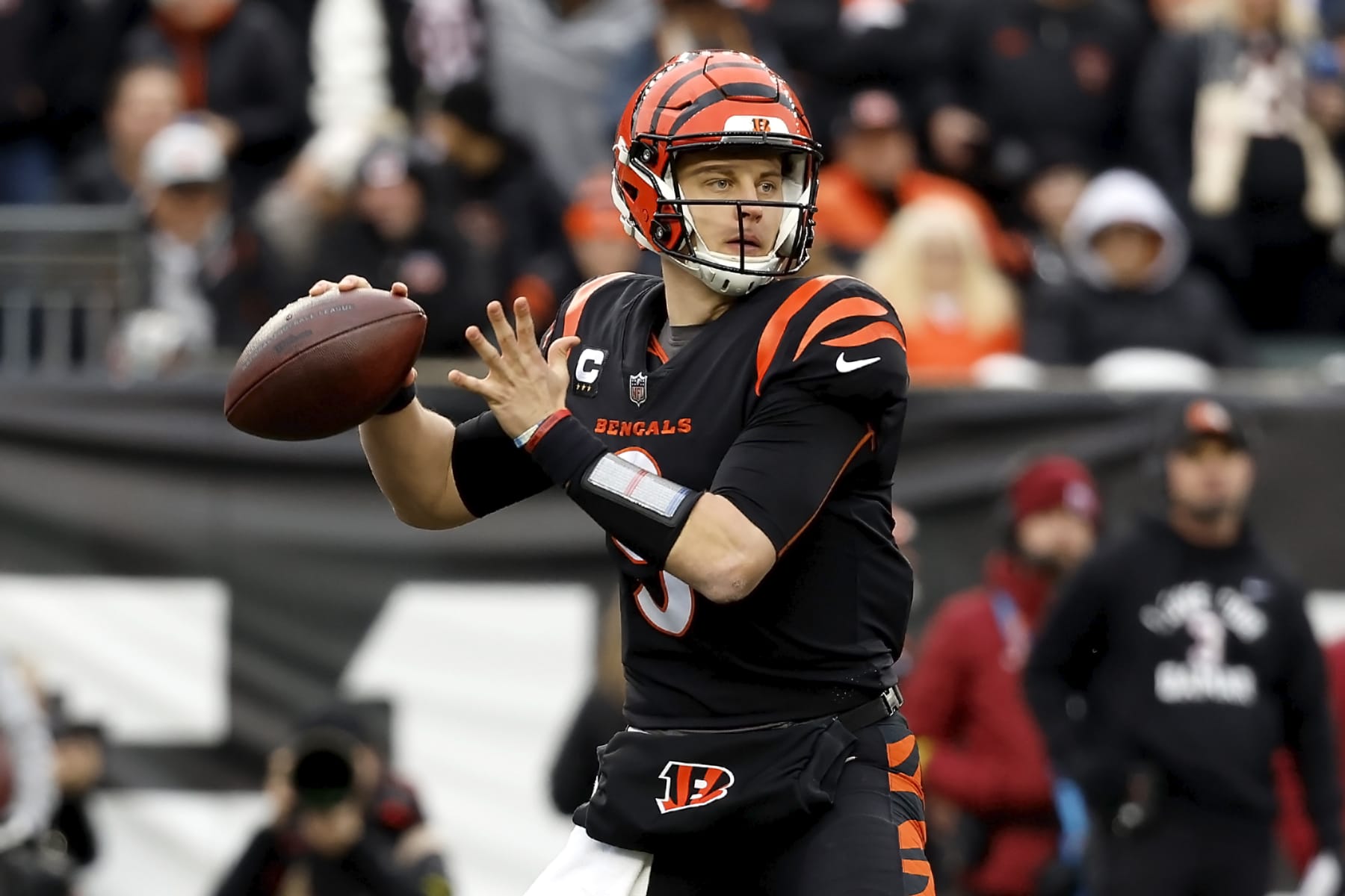 CINCINNATI, OH - JANUARY 08: Joe Burrow #9 of the Cincinnati Bengals throws the ball during the game against the Baltimore Ravens at Paycor Stadium on January 8, 2023 in Cincinnati, Ohio. (Photo by Kirk Irwin/Getty Images)