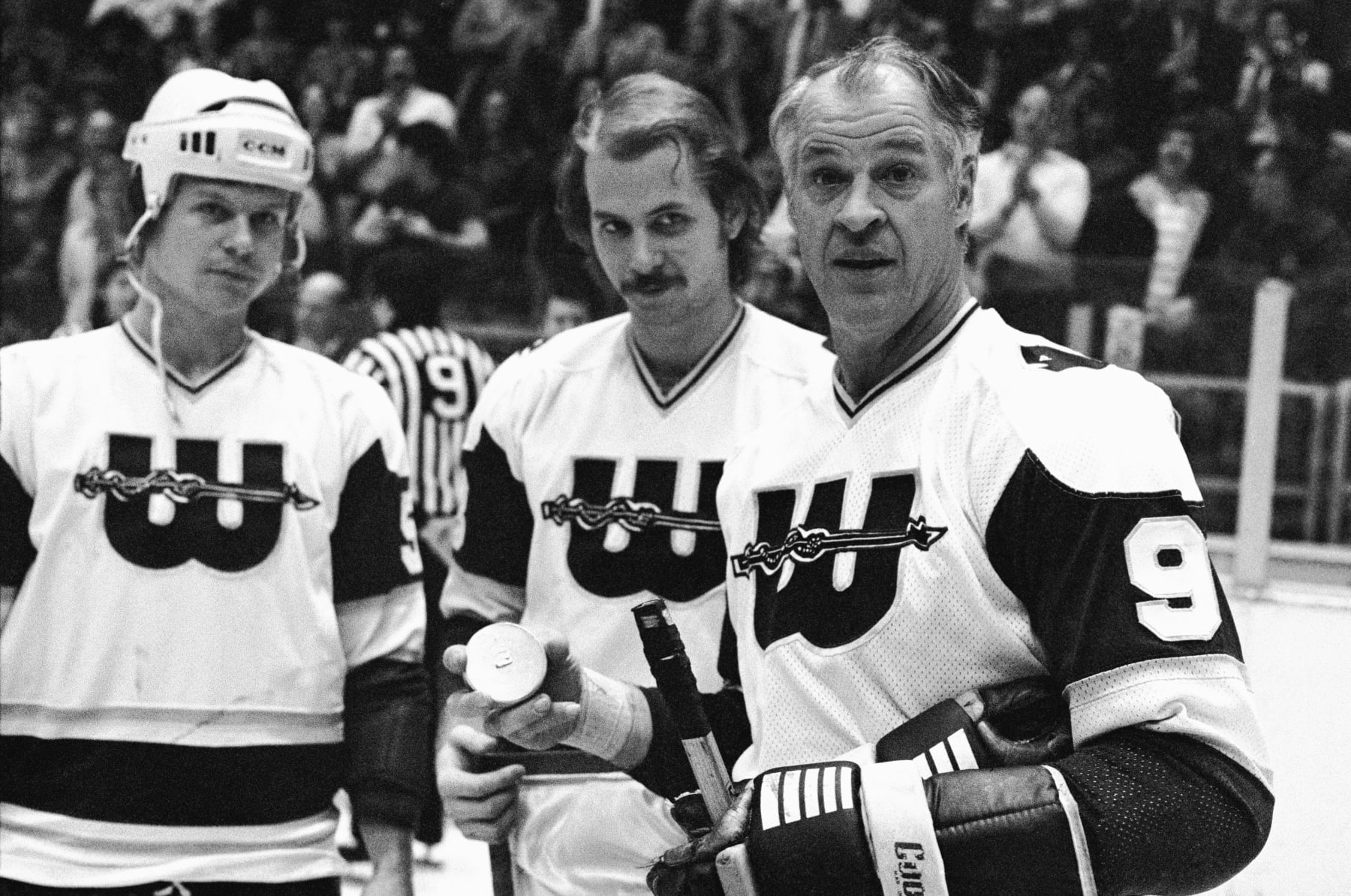 Gordie Howe (right) with sons Mark (left) and Marty Howe.
