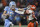 CHARLOTTE, NORTH CAROLINA - DECEMBER 03: Drake Maye #10 of the North Carolina Tar Heels gets called for a facemask penalty against Trenton Simpson #22 of the Clemson Tigers in the second quarter during the ACC Championship game at Bank of America Stadium on December 03, 2022 in Charlotte, North Carolina. (Photo by Eakin Howard/Getty Images)