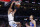 Denver Nuggets forward Aaron Gordon dunks as Oklahoma City Thunder forward Aleksej Pokusevski watches during the first half of an NBA basketball game Thursday, Nov. 3, 2022, in Oklahoma City. (AP Photo/Nate Billings)