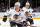 ELMONT, NEW YORK - DECEMBER 04: Jonathan Toews #19 and Patrick Kane #88 of the Chicago Blackhawks skates against the New York Islanders during the second period at the UBS Arena on December 04, 2022 in Elmont, New York. (Photo by Bruce Bennett/Getty Images)