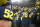 ANN ARBOR, MI - OCTOBER 29:  Michigan Wolverines quarterback J.J. McCarthy (9) and Michigan Wolverines offensive lineman Trevor Keegan (77) walk into the tunnel as they head to their locker room while fans reach out to congratulate them at the end of a college football game between the Michigan State Spartans and the Michigan Wolverines on October 29, 2022 at Michigan Stadium in Ann Arbor, Michigan.  (Photo by Scott W. Grau/Icon Sportswire via Getty Images)