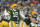 GREEN BAY, WISCONSIN - JANUARY 08: Aaron Rodgers #12 of the Green Bay Packers throws a pass against the Detroit Lions in the second half at Lambeau Field on January 08, 2023 in Green Bay, Wisconsin. (Photo by Patrick McDermott/Getty Images)