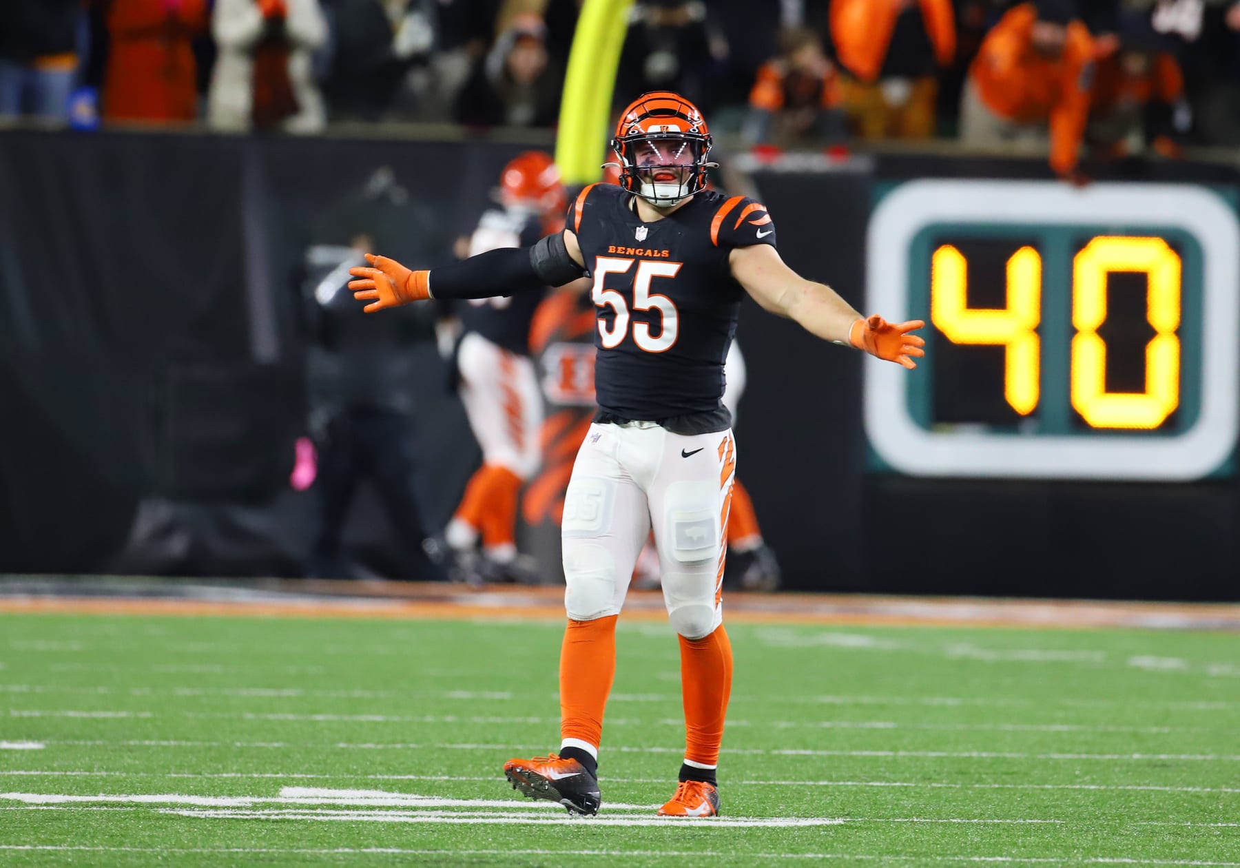 CINCINNATI, OH - JANUARY 15: Cincinnati Bengals linebacker Logan Wilson (55) celebrates in an AFC Wild Card Playoff game between the Baltimore Ravens and the Cincinnati Bengals on January 15, 2023, at Paycor Stadium in Cincinnati, OH. (Photo by Jeff Moreland/Icon Sportswire via Getty Images)