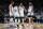 INDIANAPOLIS, INDIANA - NOVEMBER 23: Rudy Gobert #27, D'Angelo Russell #0, Karl-Anthony Towns #32, and Jaden McDaniels #3 of the Minnesota Timberwolves meet in the third quarter against the Indiana Pacers at Gainbridge Fieldhouse on November 23, 2022 in Indianapolis, Indiana. NOTE TO USER: User expressly acknowledges and agrees that, by downloading and or using this photograph, User is consenting to the terms and conditions of the Getty Images License Agreement. (Photo by Dylan Buell/Getty Images)