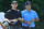DUBLIN, OHIO - JUNE 03: Rory McIlroy of Northern Ireland and  Patrick Reed of the United States look on from the 15th tree during the second round of the Memorial Tournament presented by Workday at Muirfield Village Golf Club on June 03, 2022 in Dublin, Ohio. (Photo by Sam Greenwood/Getty Images)