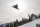 Snowboarder Kokomo Murase, of Japan, hits the first shark fin jump during the women's snowboard Slopestyle finals at X Games Aspen in Aspen, Colo., Friday, Jan. 27, 2023. Murase finished in third place. (AP Photo/Kelsey Brunner)