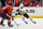 WASHINGTON, DC - JANUARY 26: Penguins left wing Jason Zucker (16) cuts back on a defenseman during the Pittsburgh Penguins versus Washington Capitals National Hockey League game on January 26, 2023 at Capital One Arena in Washington, D.C.. (Photo by Randy Litzinger/Icon Sportswire via Getty Images)