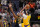 Los Angeles Lakers forward Anthony Davis (3) hits a basket over Indiana Pacers center Myles Turner (33) to take the lead in the closing seconds of the second half of an NBA basketball game in Indianapolis, Thursday, Feb. 2, 2023. The Lakers defeated the Pacers 112-111. (AP Photo/Michael Conroy)