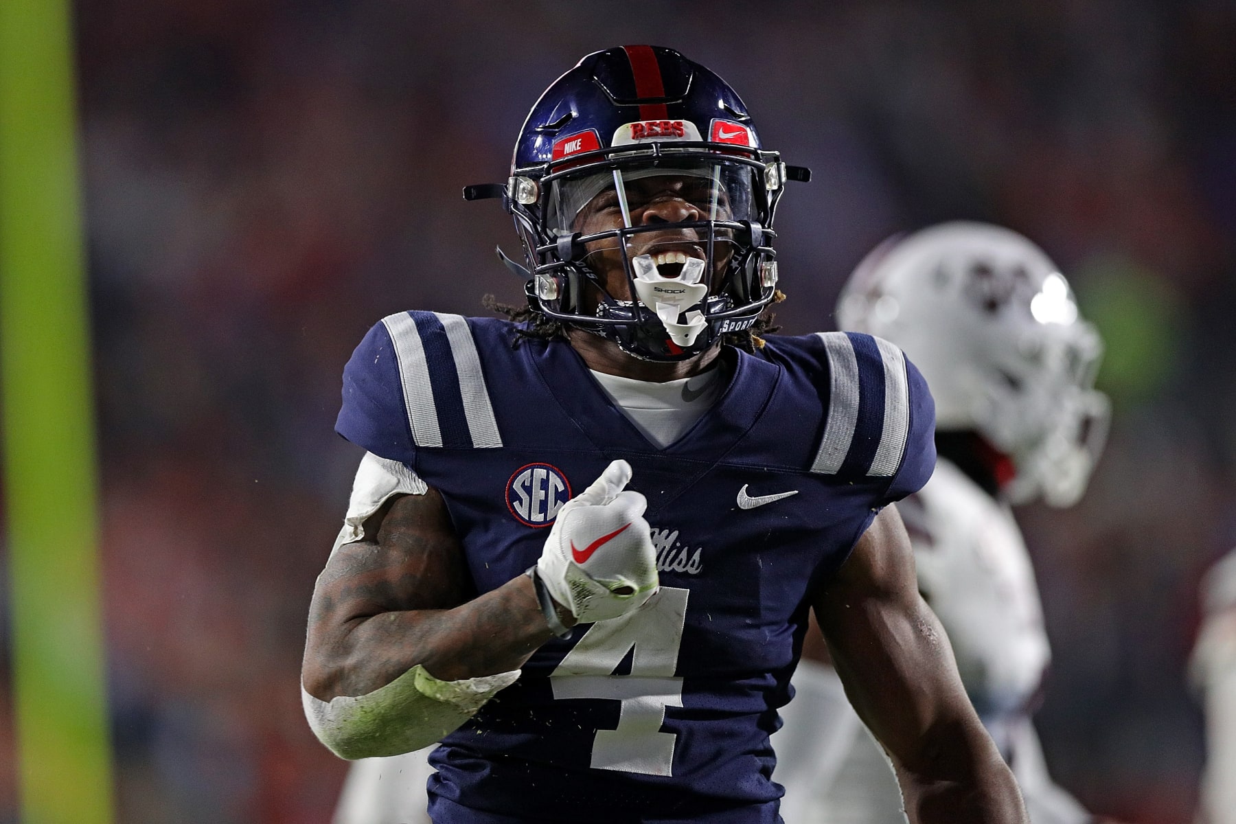 Football Football OXFORD, MISSISSIPPI - NOVEMBER 24: Quinshon Judkins #4 of the Mississippi Rebels reacts during the first half against the Mississippi State Bulldogs at Vaught-Hemingway Stadium on November 24, 2022 in Oxford, Mississippi. (Photo by Justin Ford/Getty Images)