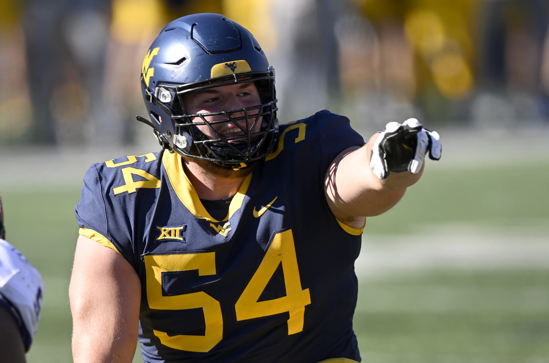 Football Football MORGANTOWN, WEST VIRGINIA - OCTOBER 29: Zach Frazier #54 of the West Virginia Mountaineers lines up against the TCU Horned Frogs at Mountaineer Field on October 29, 2022 in Morgantown, West Virginia. (Photo by G Fiume/Getty Images)