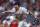 Houston Astros relief pitcher Seth Martinez watches a throw to a Cleveland Guardians batter during the eighth inning of a baseball game Friday, Aug. 5, 2022, in Cleveland. (AP Photo/Ron Schwane)