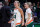 CORAL GABLES, FLORIDA - FEBRUARY 09: Haley Cavinder #14 and Hanna Cavinder #15 of the Miami Hurricanes react during the fourth quarter of the game against the Florida State Seminoles at Watsco Center on February 09, 2023 in Coral Gables, Florida. (Photo by Megan Briggs/Getty Images)