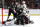 TEMPE, ARIZONA - FEBRUARY 28: Nick Ritchie #12 of the Arizona Coyotes gets pushed by Ian Mitchell #51 of the Chicago Blackhawks which starts a scrum between Travis Boyd #72 of the Arizona Coyotes and Joey Anderson #15 of the Chicago Blackhawks in the second period at Mullett Arena on February 28, 2023 in Tempe, Arizona. (Photo by Zac BonDurant/Getty Images)