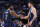 DALLAS, TX - FEBRUARY 26 : Kyrie Irving #2 and teammate Luka Doncic #77 of the Dallas Mavericks shake hands during a game against the Los Angeles Lakers at American Airlines Center on February 26, 2023 in Dallas, Texas. NOTE TO USER: User expressly acknowledges and agrees that, by downloading and or using this photograph, User is consenting to the terms and conditions of the Getty Images License Agreement. (Photo by Ron Jenkins/Getty Images)