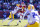 FAYETTEVILLE, ARKANSAS - NOVEMBER 12: Malik Hornsby #4 of the Arkansas Razorbacks runs the ball and is tackled by Harold Perkins Jr. #40 of the LSU Tigers at Donald W. Reynolds Razorback Stadium on November 12, 2022 in Fayetteville, Arkansas. The Tigers defeated the Razorbacks 13-10. (Photo by Wesley Hitt/Getty Images)