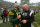GREEN BAY, WI - OCTOBER 16: Green Bay Packers quarterback Aaron Rodgers (12) talks with Recent York Jets defensive line coach Aaron Whitecotton all over a game between the Green Bay Packers and the Recent York Jets at Lambeau Enviornment on October 16, 2022 in Green Bay, WI. (Describe by Larry Radloff/Icon Sportswire by strategy of Getty Photos)
