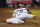 Arizona Diamondbacks' Jake McCarthy (30) looks at the umpire after being called out at the plate on a fielders choice hit into by Daulton Varsho during the eighth inning of a baseball game against the San Diego Padres, Thursday, Sept. 15, 2022, in Phoenix. (AP Photo/Matt York)