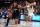 DALLAS, TEXAS - OCTOBER 30: Paolo Banchero #5 of the Orlando Magic drives against Josh Green #8 of the Dallas Mavericks in the first half at American Airlines Center on October 30, 2022 in Dallas, Texas. NOTE TO USER: User expressly acknowledges and agrees that, by downloading and/or using this Photograph, user is consenting to the terms and conditions of the Getty Images License Agreement. (Photo by Richard Rodriguez/Getty Images)