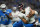 DETROIT, MICHIGAN - JANUARY 01: Justin Fields #1 of the Chicago Bears is sacked during the third quarter in the game against the Detroit Lions at Ford Field on January 01, 2023 in Detroit, Michigan. (Photo by Nic Antaya/Getty Images)