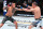 LAS VEGAS, NEVADA - JUNE 04: (L-R) Jeff Molina punches Zhalgas Zhumagulov of Kazakstan in a flyweight fight during the UFC Fight Night event at UFC APEX on June 04, 2022 in Las Vegas, Nevada. (Photo by Chris Unger/Zuffa LLC)