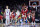 DES MOINES, IOWA - MARCH 18: Anthony Black #0 and Davonte Davis #4 of the Arkansas Razorbacks celebrate after defeating the Kansas Jayhawks in the second round of the NCAA Men's Basketball Tournament at Wells Fargo Arena on March 18, 2023 in Des Moines, Iowa. (Photo by Michael Reaves/Getty Images)