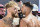 Jake Paul, left, and Tommy Fury, face off after a weigh-in, a day before their match, in Riyadh, Saudi Arabia, Saturday, Feb. 25, 2023. (AP Photo)