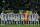Barcelona players observe a minute of silence for victims of earthquake in Turkey and Syria prior to the start of a Spanish La Liga soccer match between Villarreal and Barcelona, at the Ceramica stadium in Villarreal, Spain, Sunday, Feb. 12, 2023. (AP Photo/Alberto Saiz)