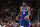 CHICAGO, ILLINOIS - MARCH 22: Joel Embiid #21 of the Philadelphia 76ers handles the basketball in the first half against the Chicago Bulls at United Center on March 22, 2023 in Chicago, Illinois.  NOTE TO USER: User expressly acknowledges and agrees that, by downloading and or using this photograph, User is consenting to the terms and conditions of the Getty Images License Agreement.  (Photo by Quinn Harris/Getty Images)