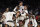 San Diego State guard Lamont Butler (5) celebrates with teammates after scoring the winning basket against Florida Atlantic during a Final Four college basketball game in the NCAA Tournament on Saturday, April 1, 2023, in Houston. (AP Photo/Brynn Anderson)