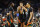 HOUSTON, TEXAS - APRIL 01: Isaiah Wong #2 of the Miami Hurricanes and teammates huddle prior to the game against the Connecticut Huskies during the NCAA Men's Basketball Tournament Final Four semifinal game at NRG Stadium on April 01, 2023 in Houston, Texas. (Photo by Gregory Shamus/Getty Images)