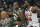 Milwaukee Bucks' Khris Middleton tries to get past Chicago Bulls' Patrick Williams during the first half of an NBA basketball game Wednesday, April 5, 2023, in Milwaukee. (AP Photo/Morry Gash)