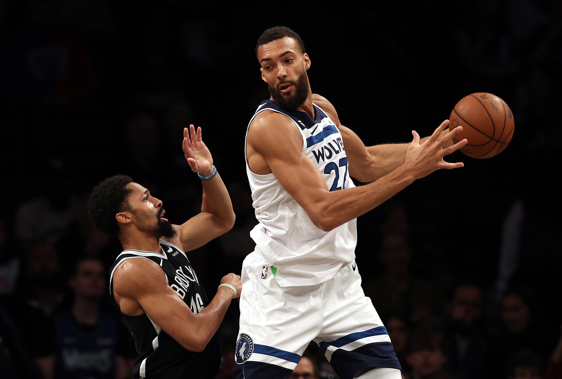 NEW YORK CITY, NEW YORK - APRIL 04: Rudy Gobert # 27 of the Minnesota Timberwolves manages the ball as Spencer Dinwiddie # 26 of the Brooklyn Nets protects throughout the video game at Barclays Center on April 04, 2023 in New York City. (Photo by Jamie Squire/Getty Images)