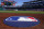 The on-deck circle with the MLB logo is in place before a baseball game between the Washington Nationals and the Atlanta Braves at Nationals Park, Sunday, April 2, 2023, in Washington. (AP Photo/Alex Brandon)