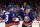 ELMONT, NEW YORK - APRIL 12: (L-R) Noah Dobson #8, Brock Nelson #29 and Pierre Engvall #18 of the New York Islanders celebrate Nelson's second period goal against the Montreal Canadiens at the UBS Arena on April 12, 2023 in Elmont, New York. (Photo by Bruce Bennett/Getty Images)