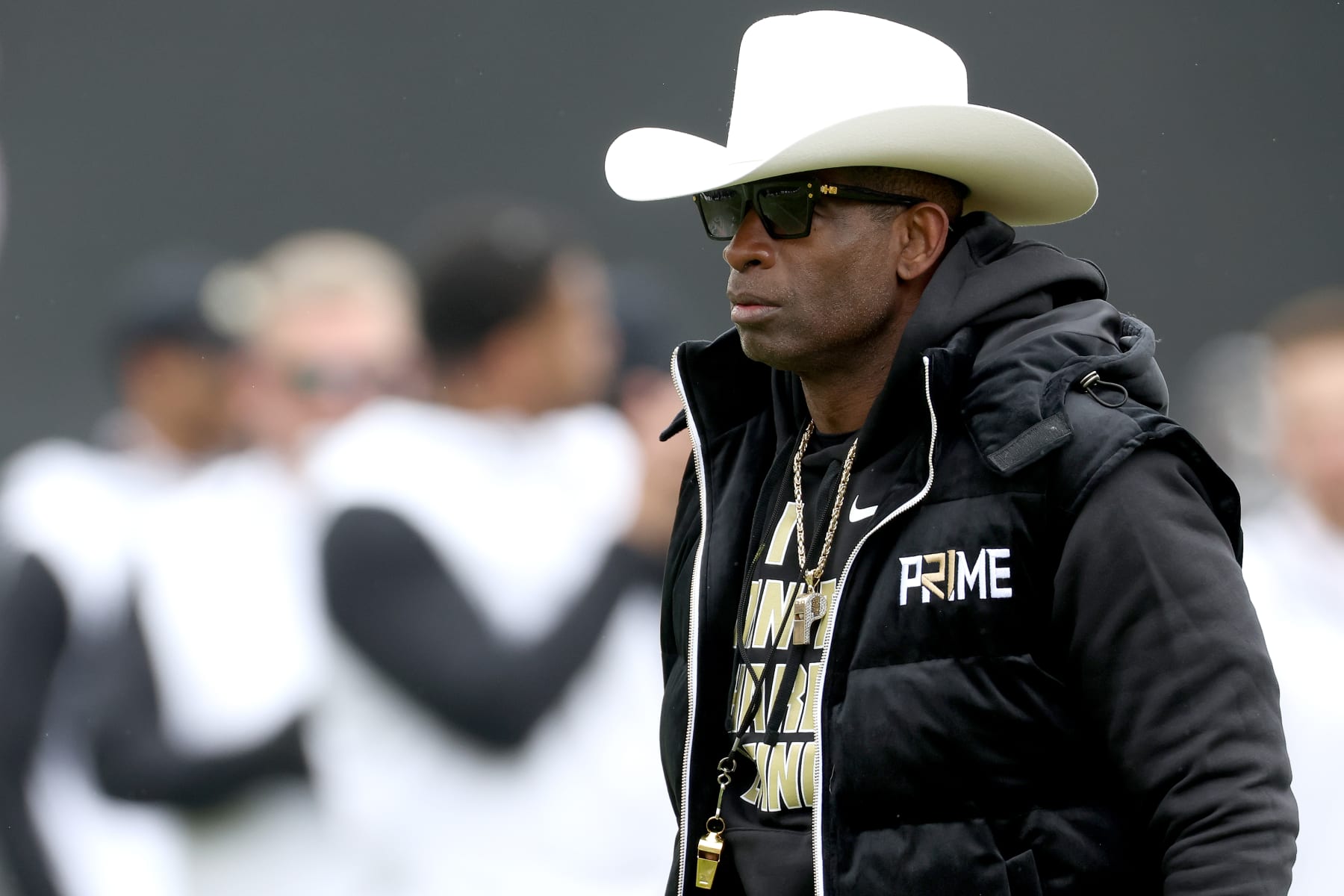 Football BOULDER, COLORADO - APRIL 22: Head coach Deion Sanders of the Colorado Buffaloes watches as his team warms up prior to their spring game at Folsom Field on April 22, 2023 in Boulder, Colorado. (Photo by Matthew Stockman/Getty Images)