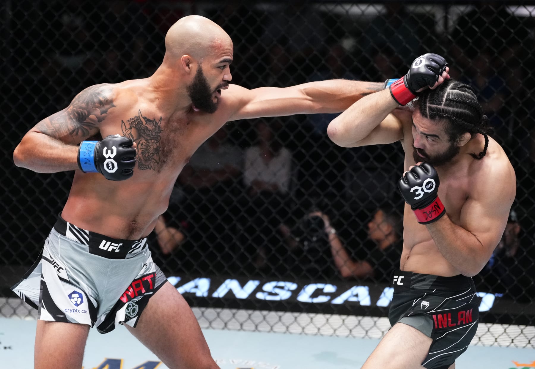LAS VEGAS, NEVADA - APRIL 29: (L-R) Trey Waters punches Josh Quinlan in a heavyweight fight during the UFC Fight Night event at UFC APEX on April 29, 2023 in Las Vegas, Nevada. (Photo by Jeff Bottari/Zuffa LLC via Getty Images)