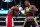 Errol Spence Jr.  (right) connects with a punch against Yordenis Ugas