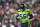 SEATTLE, WASHINGTON - DECEMBER 15: Jordyn Brooks #56 of the Seattle Seahawks runs off the field during the second quarter of a game against the San Francisco 49ers at Lumen Field on December 15, 2022 in Seattle, Washington. (Photo by Christopher Mast/Getty Images)