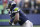 Seattle Seahawks running back Adrian Peterson carries the ball during warmups before an NFL football game against the San Francisco 49ers, Sunday, Dec. 5, 2021, in Seattle. (AP Photo/Elaine Thompson)