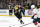 BOSTON, MA - APRIL 30: Boston Bruins steady defenseman Charlie McAvoy (73) picks up the puck for the length of Sport 7 of an Jap Convention First Round playoff contest between the Boston Bruins and the Florida Panthers on April 30, 2023, at TD Garden in Boston, Massachusetts.(Report by Fred Kfoury III/Icon Sportswire via Getty Images)