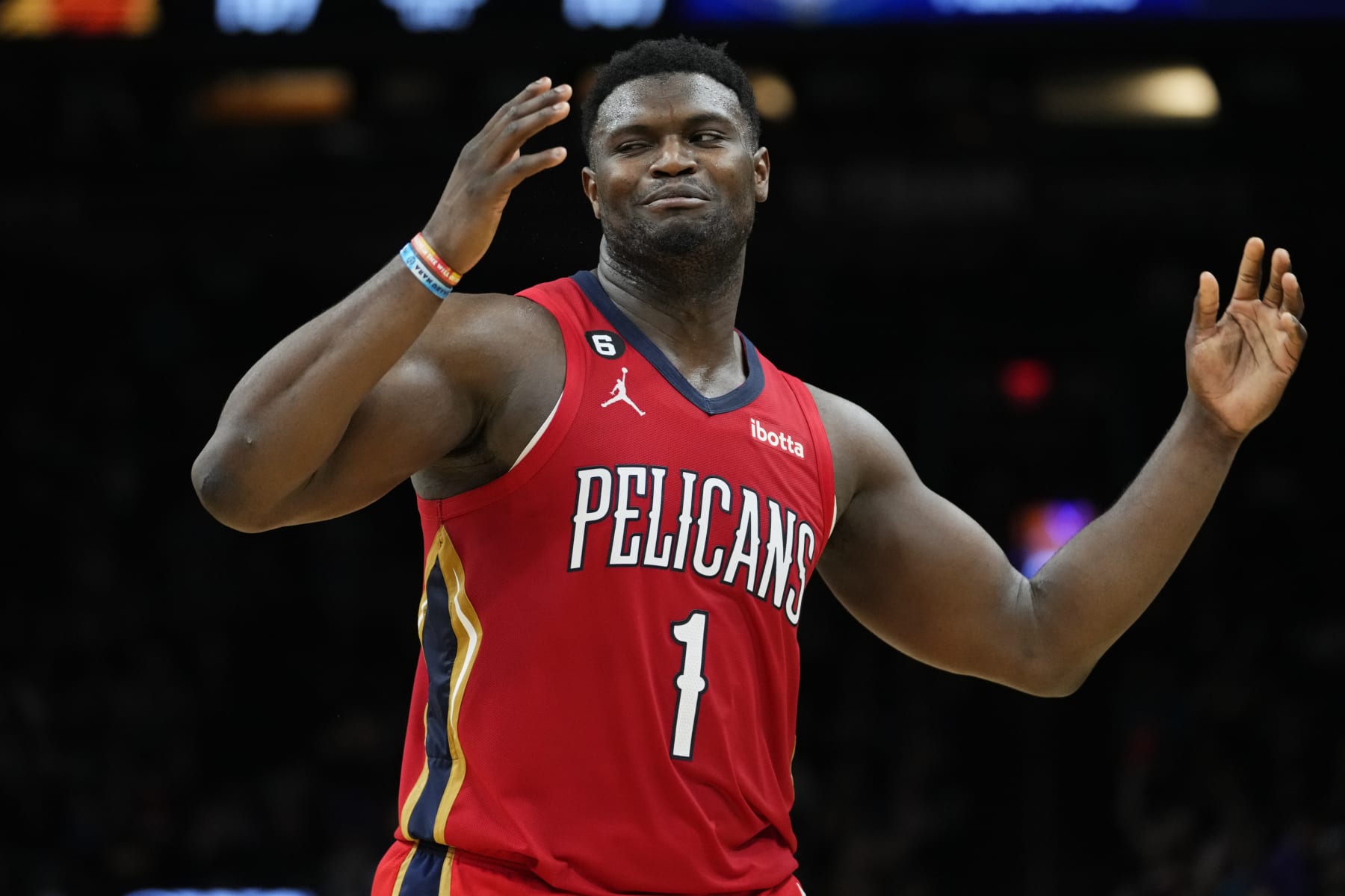 New Orleans Pelicans forward Zion Williamson (1) reacts to a foul call during the second half of an NBA basketball game against the Phoenix Suns, Saturday, Dec. 17, 2022, in Phoenix. (AP Photo/Matt York)