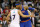CHARLOTTE, NC - NOVEMBER 11:  Former teammates Jeremy Lin #7 of the Charlotte Hornets and Carmelo Anthony #7 of the New York Knicks shake hands after the Hornets defeated the Knicks 95-93 during their game at Time Warner Cable Arena on November 11, 2015 in Charlotte, North Carolina. NOTE TO USER: User expressly acknowledges and agrees that, by downloading and or using this photograph, User is consenting to the terms and conditions of the Getty Images License Agreement.  (Photo by Streeter Lecka/Getty Images)