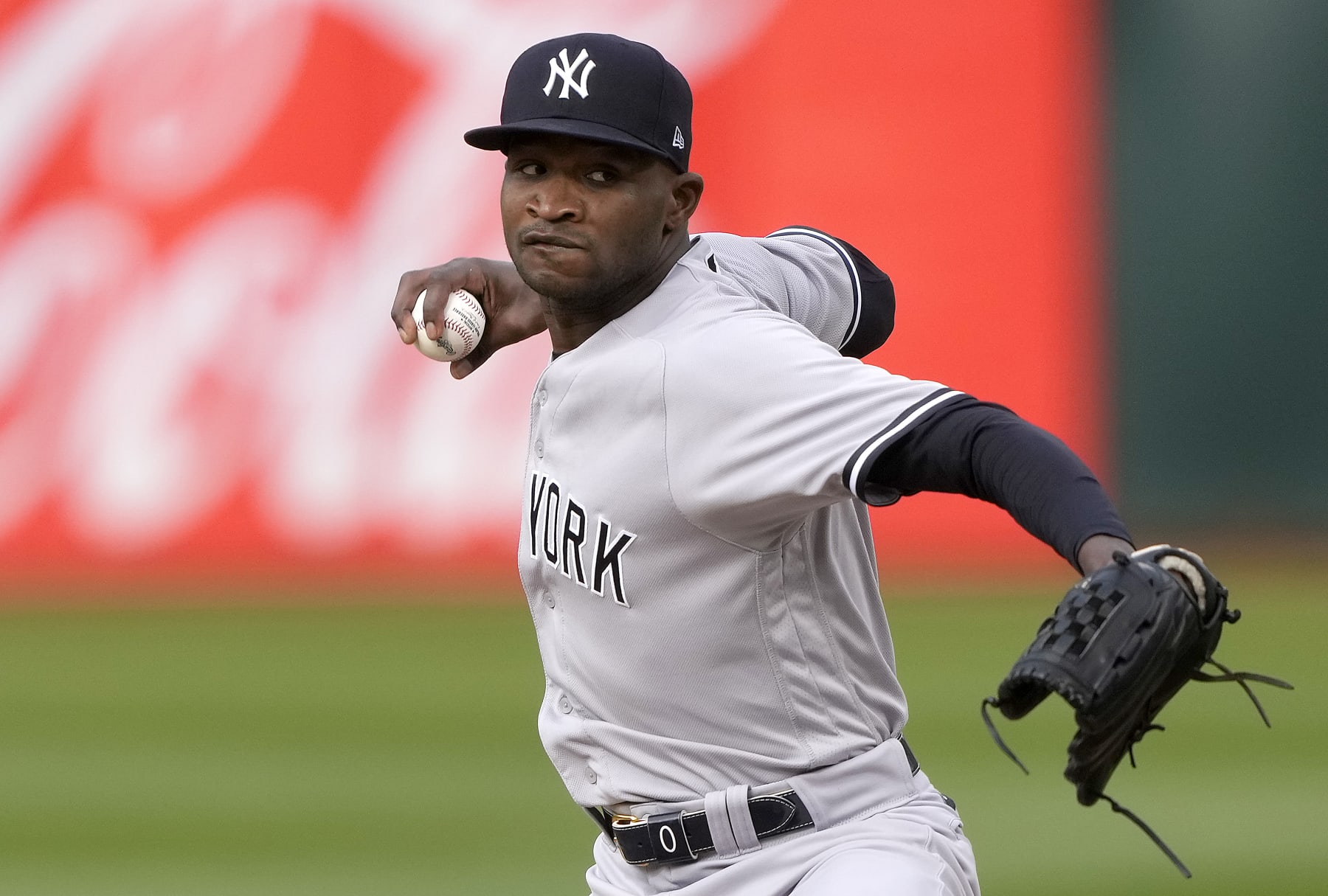 OAKLAND, CALIFORNIA - JUNE 28: Domingo German #0 of the New York Yankees pitches against the Oakland Athletics in the bottom of the first inning at RingCentral Coliseum on June 28, 2023 in Oakland, California. (Photo by Thearon W. Henderson/Getty Images)